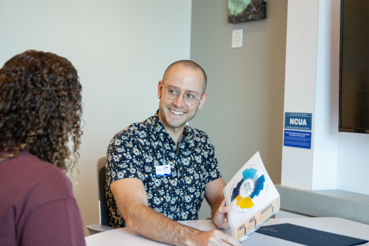 A Youth & College advisor meets with a student at 3Rivers