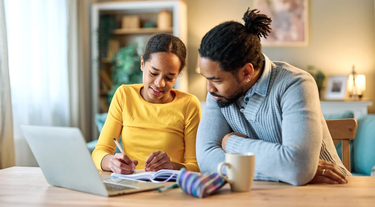 A mother and daughter working on homework